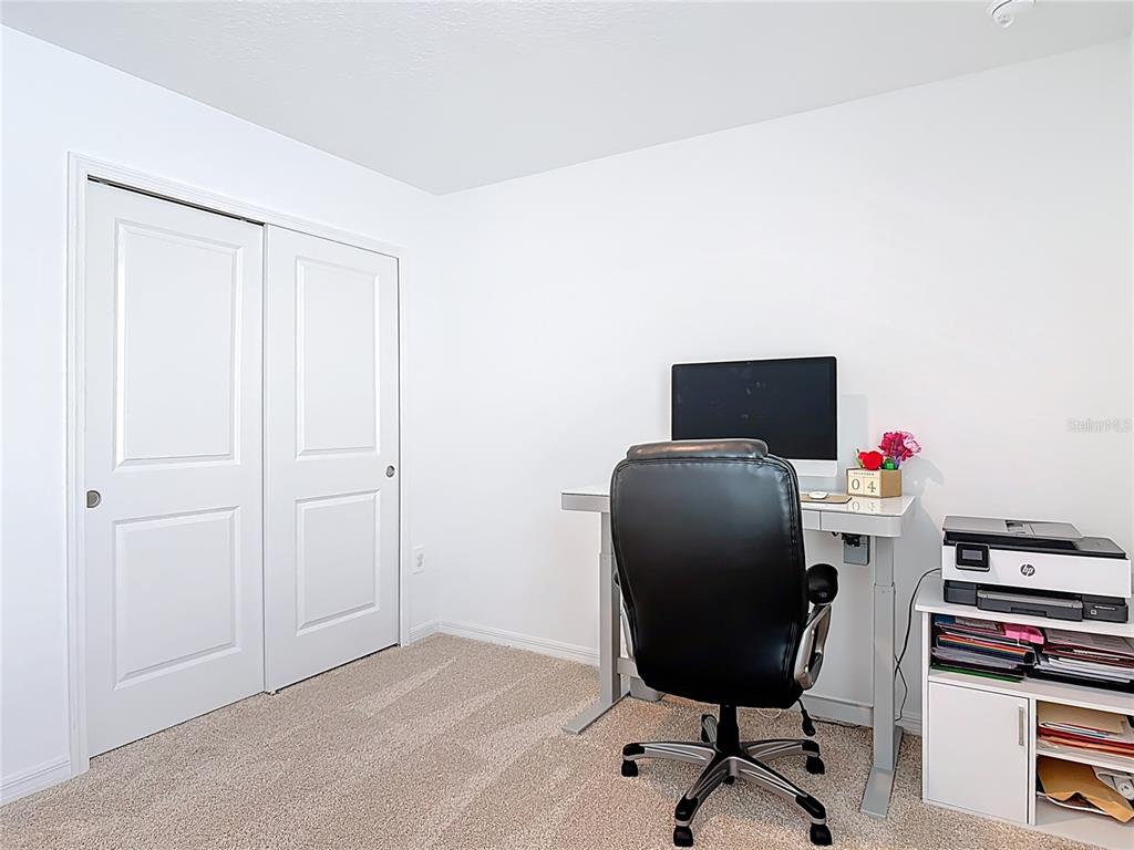 1146 Calico Pointe Circle Groveland, FL 34736 - Photo 35 of 54 a view of a workspace with furniture