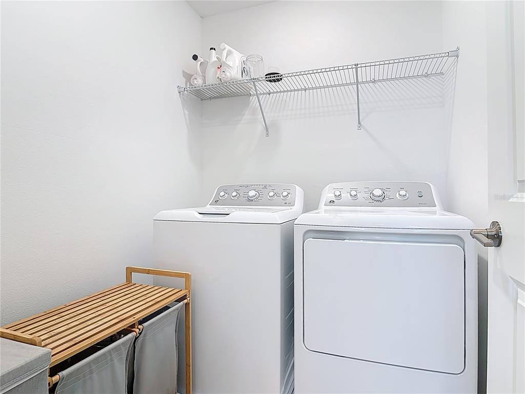 1146 Calico Pointe Circle Groveland, FL 34736 - Photo 38 of 54 a utility room with dryer and washer