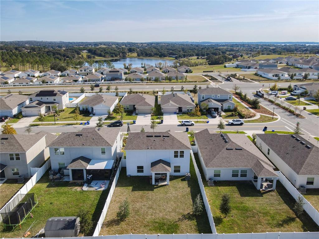 1146 Calico Pointe Circle Groveland, FL 34736 - Photo 50 of 54 an aerial view of a house with swimming pool and ocean view