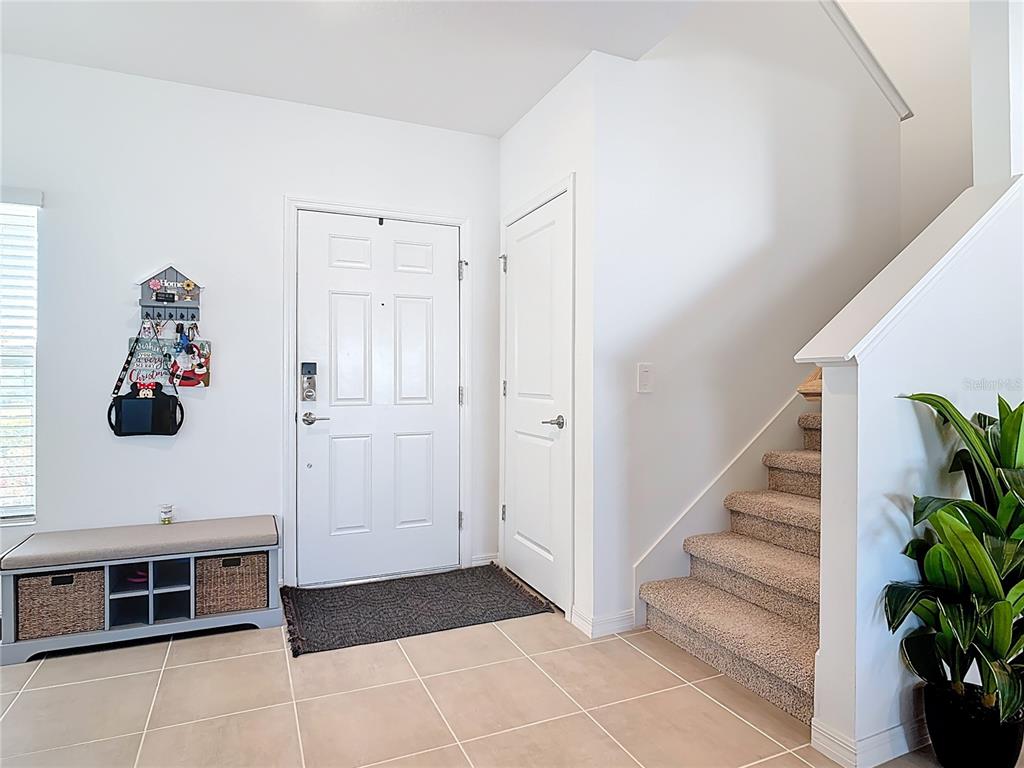 1146 Calico Pointe Circle Groveland, FL 34736 - Photo 5 of 54 a view of entryway and hall