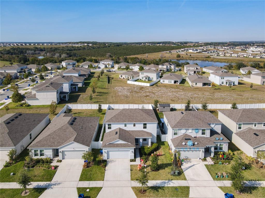 1146 Calico Pointe Circle Groveland, FL 34736 - Photo 53 of 54 an aerial view of residential building with outdoor space