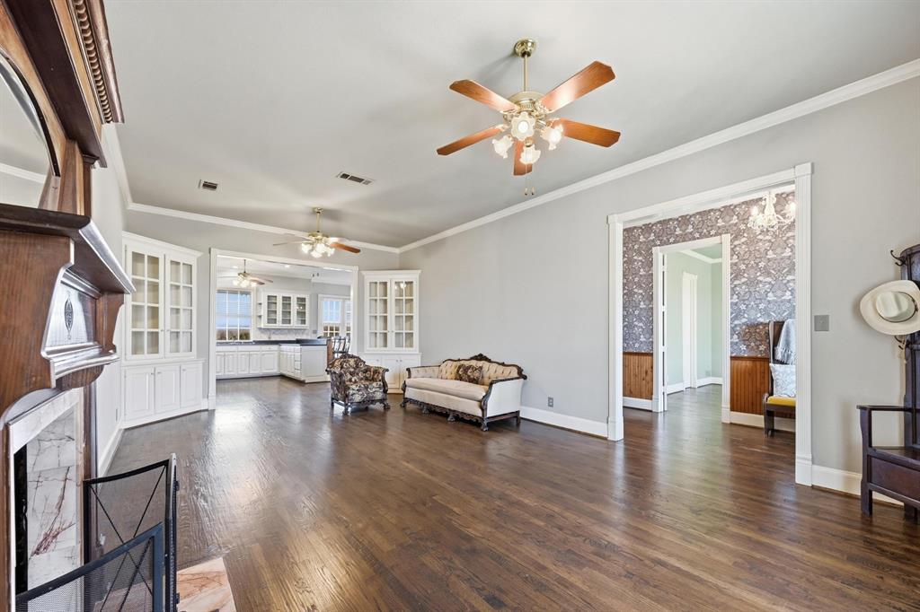 707 Cullins Road Rockwall, TX 75032 - Photo 14 of 40 a living room with furniture and wooden floor
