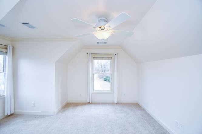 4814 Amal Lane Gainesville, GA 30506 - Photo 20 of 40 a view of a chandelier fan and a window