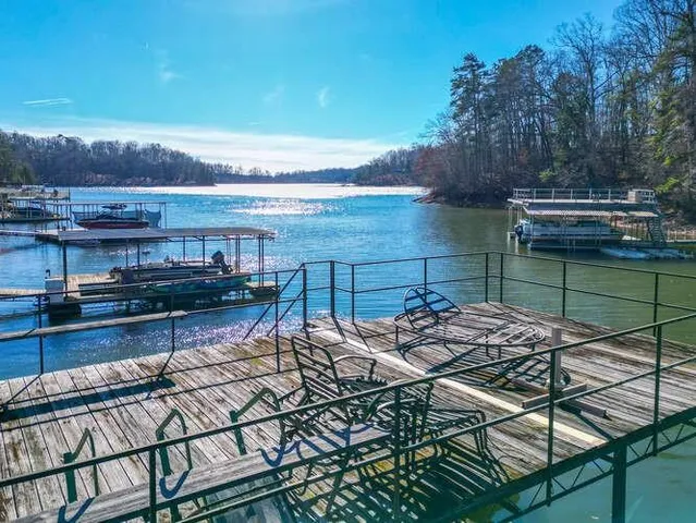 a view of a backyard and sitting area
