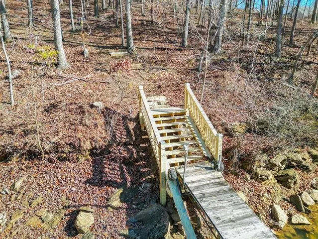 an aerial view of residential house and outdoor space
