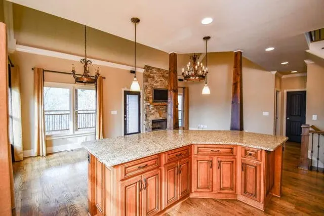 a bathroom with a sink a vanity a mirror and shower