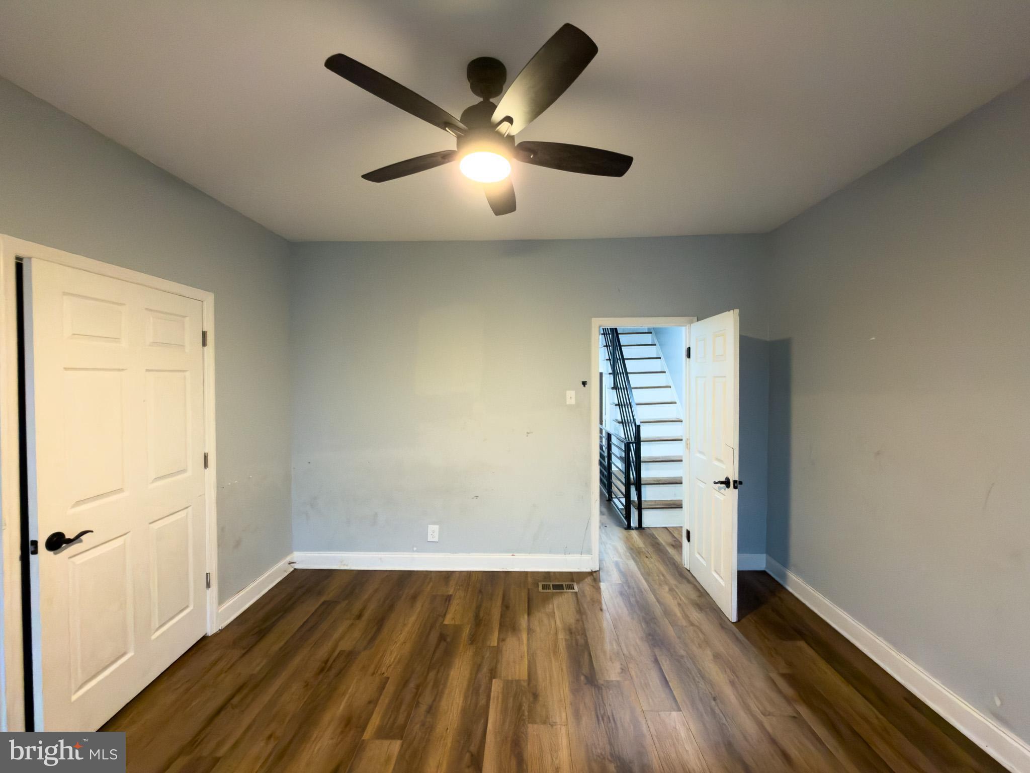 1848 North 27th Street Philadelphia, PA 19121 - Photo 16 of 29 an empty room with wooden floor and windows