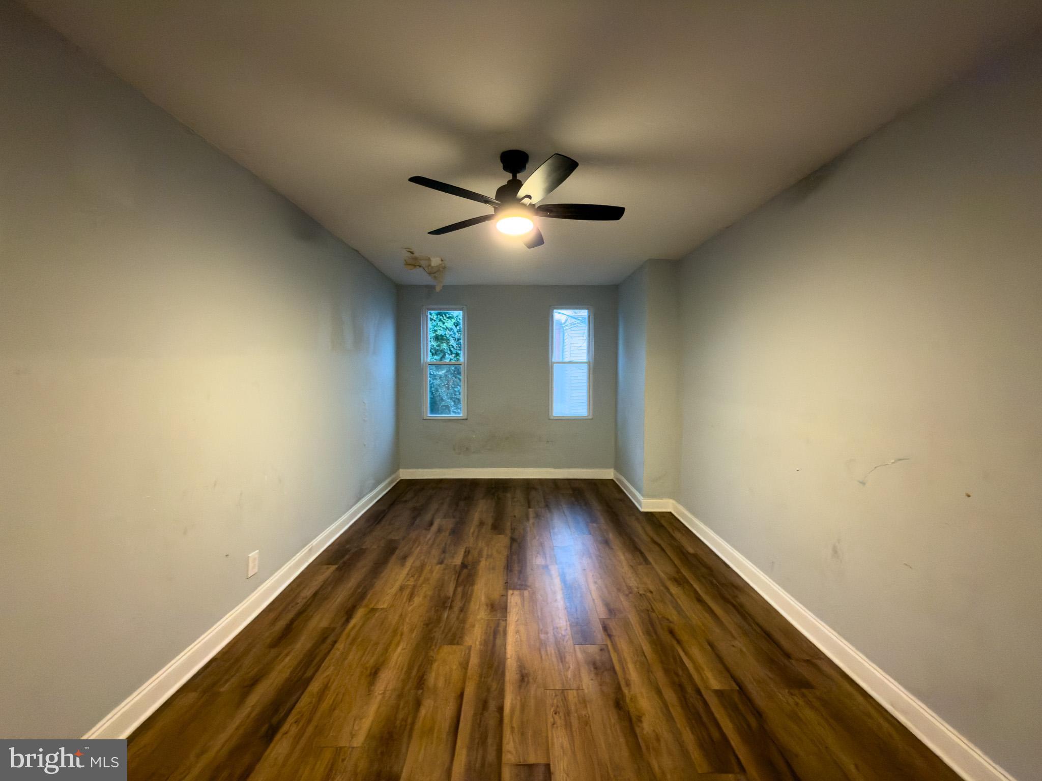 1848 North 27th Street Philadelphia, PA 19121 - Photo 19 of 29 wooden floor in an empty room with a window