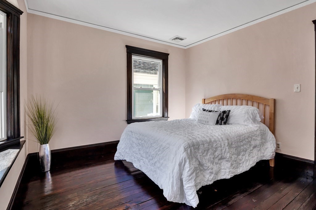 20 Usher Road Medford, MA 02155 - Photo 17 of 42 a bedroom with a bed and a window