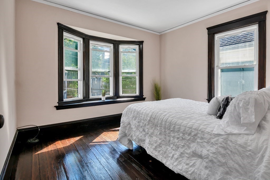 20 Usher Road Medford, MA 02155 - Photo 18 of 42 a bedroom with a bed and window