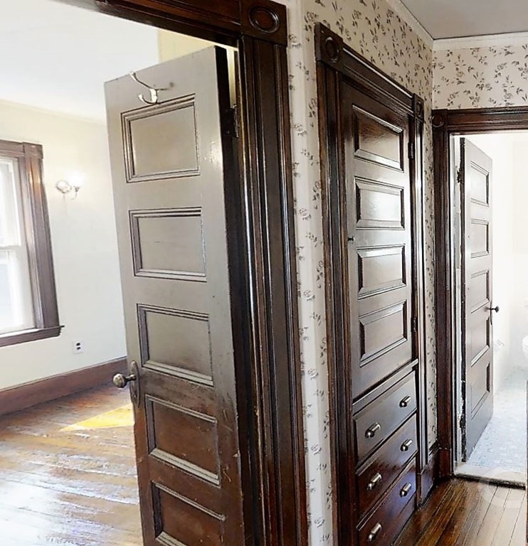 20 Usher Road Medford, MA 02155 - Photo 24 of 42 a view of kitchen and hallway with wooden floor