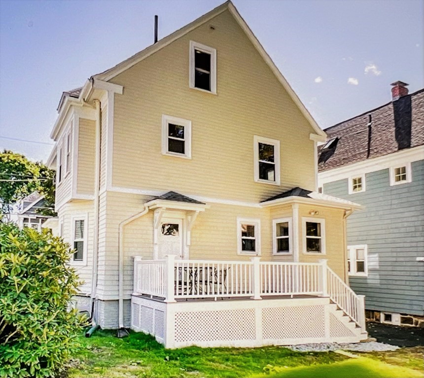 20 Usher Road Medford, MA 02155 - Photo 28 of 42 a front view of a house with a yard