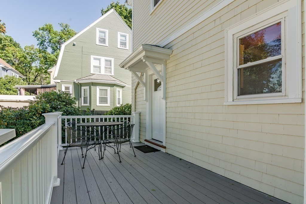 20 Usher Road Medford, MA 02155 - Photo 29 of 42 a view of a wooden chairs on the deck