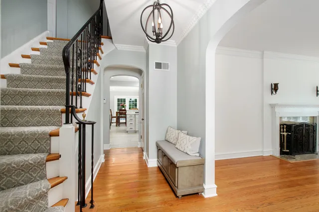 a view of entryway with wooden floor