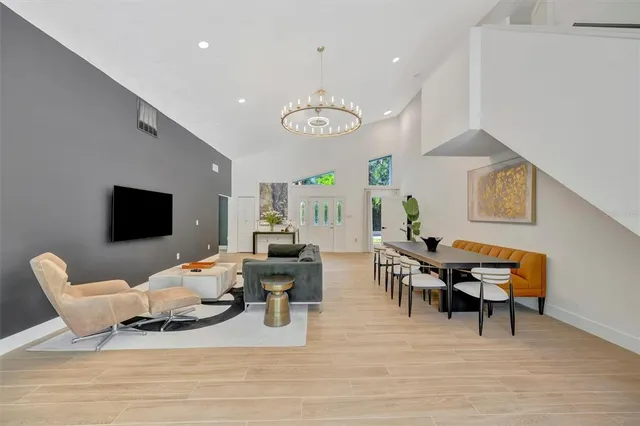 a kitchen with stainless steel appliances a refrigerator and a sink
