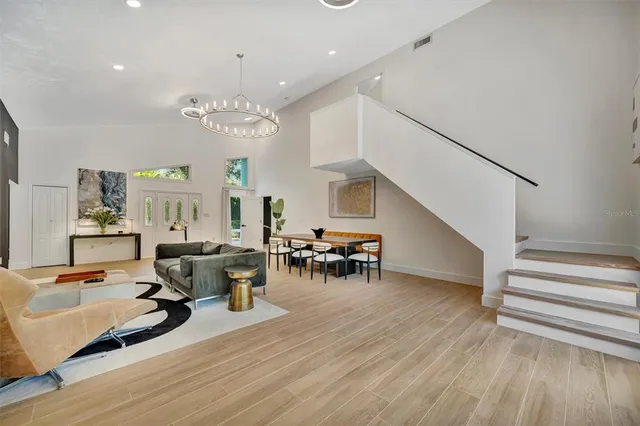 a view of storage and utility room with wooden floor
