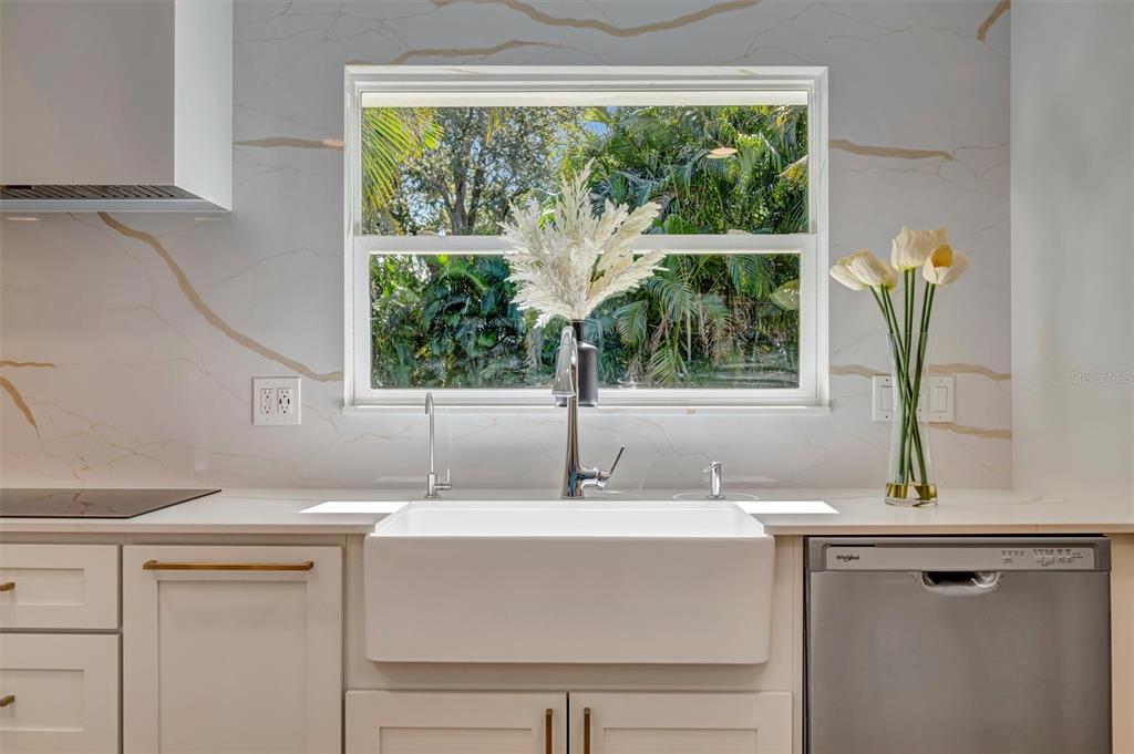 403 Longbow Trail Osprey, FL 34229 - Photo 24 of 99 a bathroom with a sink and a window