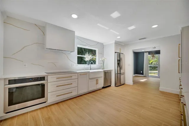 a bathroom with a tub and shower