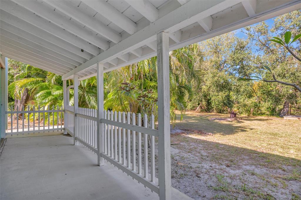 403 Longbow Trail Osprey, FL 34229 - Photo 43 of 99 a view of a porch