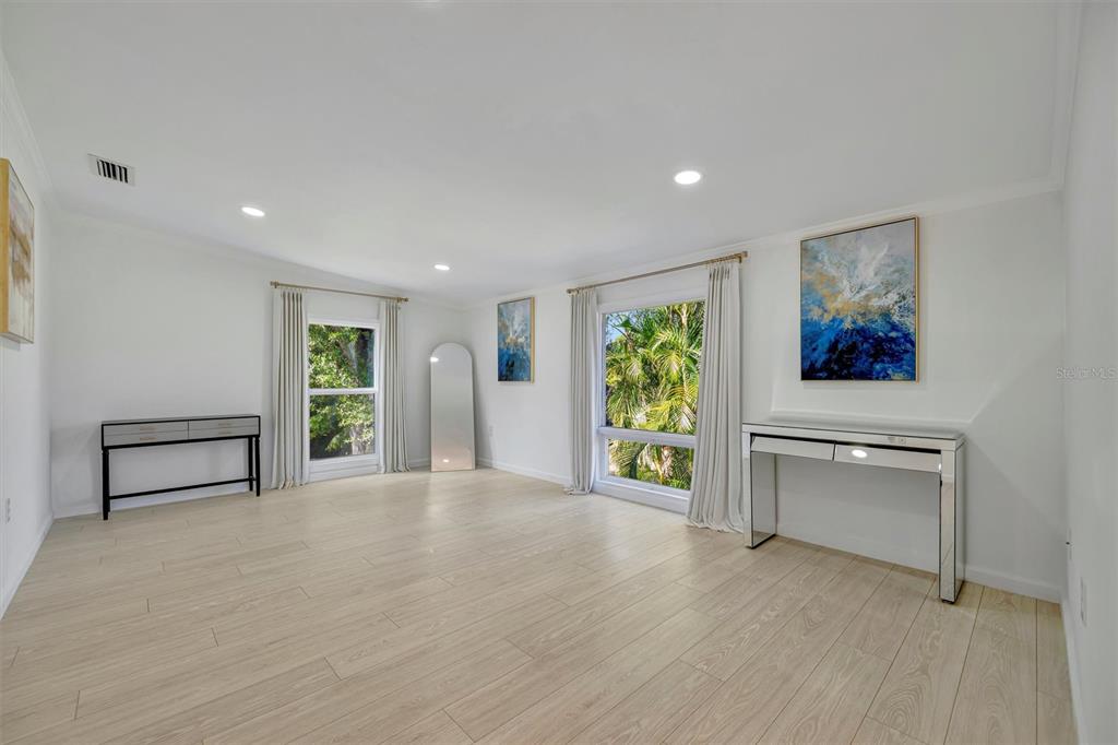 403 Longbow Trail Osprey, FL 34229 - Photo 47 of 99 a view of an empty room with a window and a kitchen
