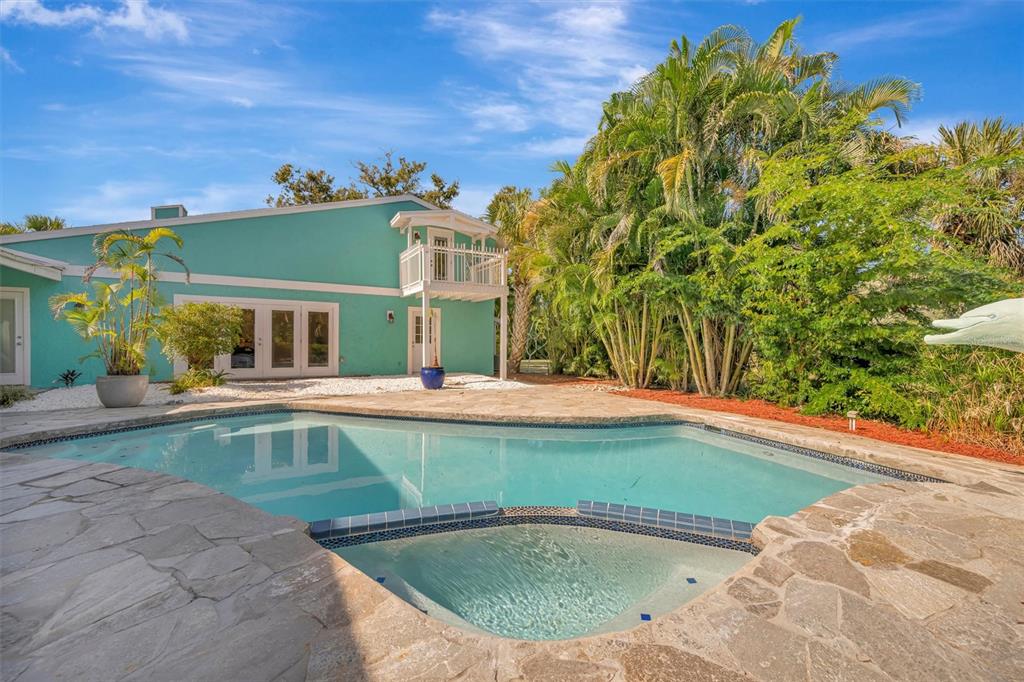 403 Longbow Trail Osprey, FL 34229 - Photo 60 of 99 a view of a house with swimming pool
