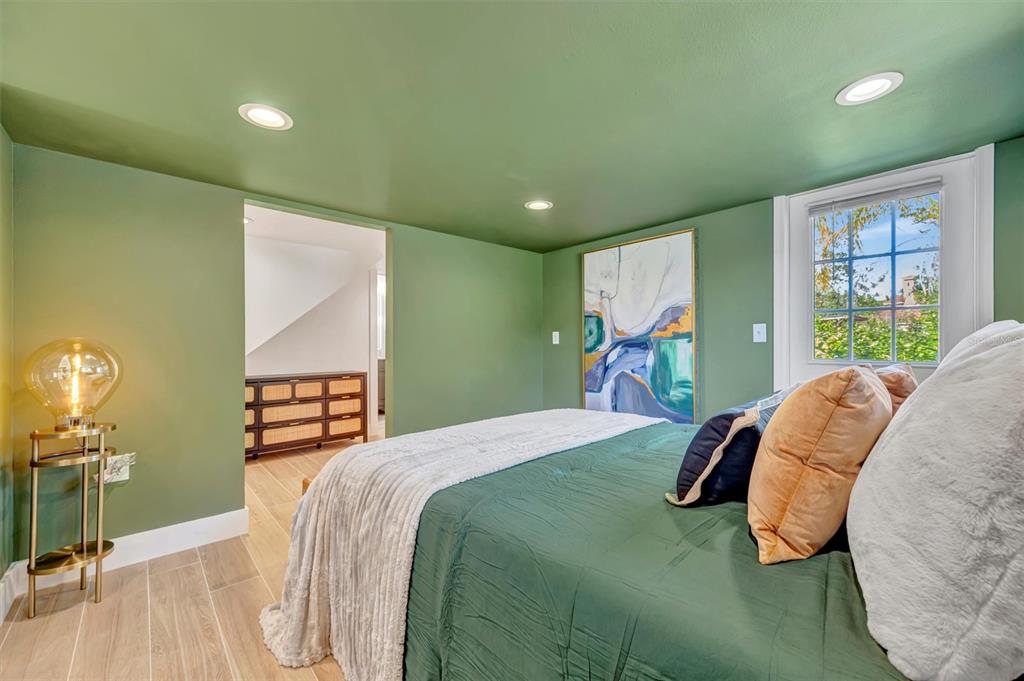 403 Longbow Trail Osprey, FL 34229 - Photo 71 of 99 a bedroom with a bed and a view of kitchen