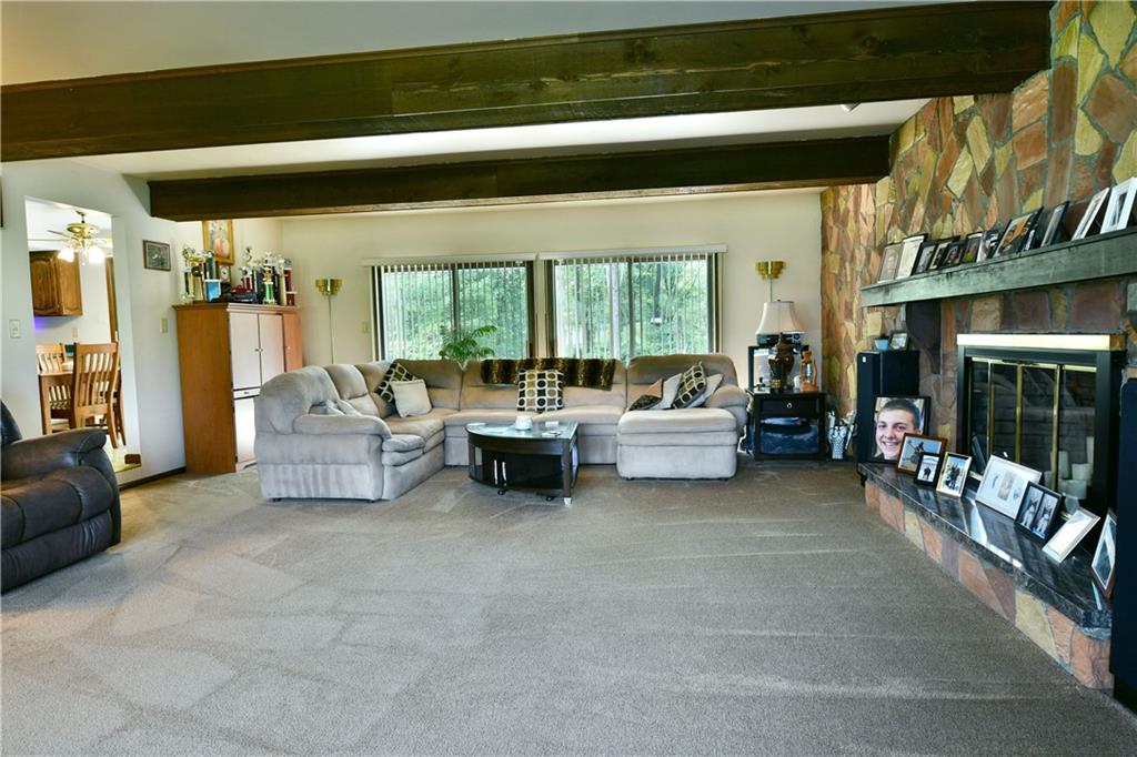 108 Davis Lane Freedom, PA 15042 - Photo 14 of 50 a living room with furniture and a floor to ceiling window