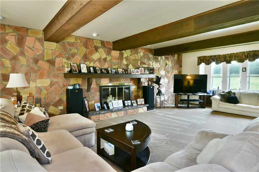 108 Davis Lane Freedom, PA 15042 - Photo 17 of 50 a living room with furniture and a flat screen tv