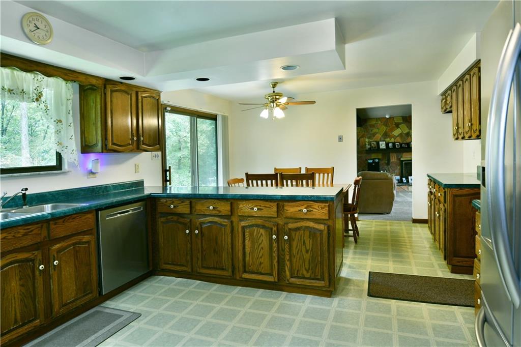 108 Davis Lane Freedom, PA 15042 - Photo 23 of 50 a bathroom with a sink a mirror and a bath tub