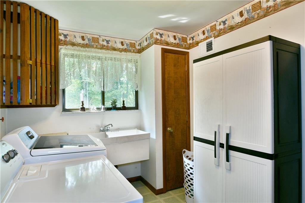 108 Davis Lane Freedom, PA 15042 - Photo 25 of 50 a bathroom with a sink toilet and shower