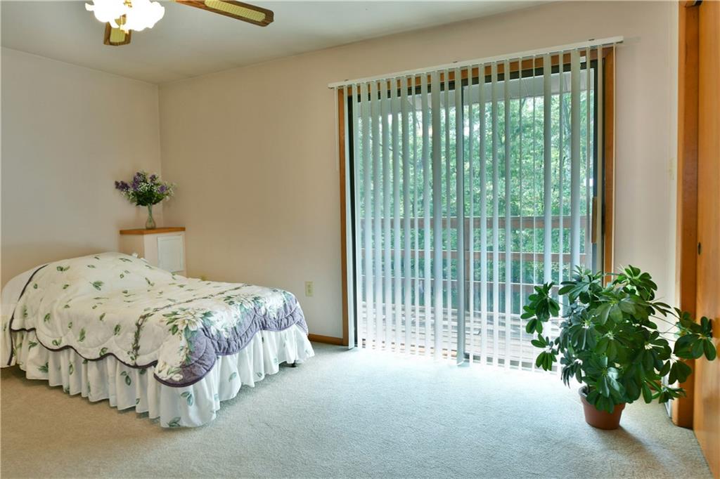 108 Davis Lane Freedom, PA 15042 - Photo 29 of 50 a bed sitting in a bedroom next to a window