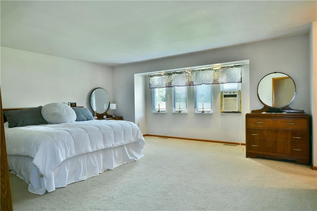 108 Davis Lane Freedom, PA 15042 - Photo 36 of 50 a bedroom with a bed and a dresser