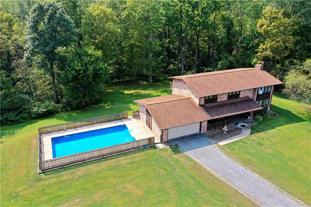 108 Davis Lane Freedom, PA 15042 - Photo 4 of 50 a view of a backyard with swimming pool