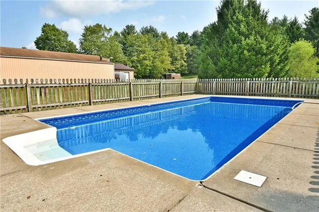 a view of a back yard of the house