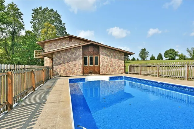 an aerial view of a house having yard