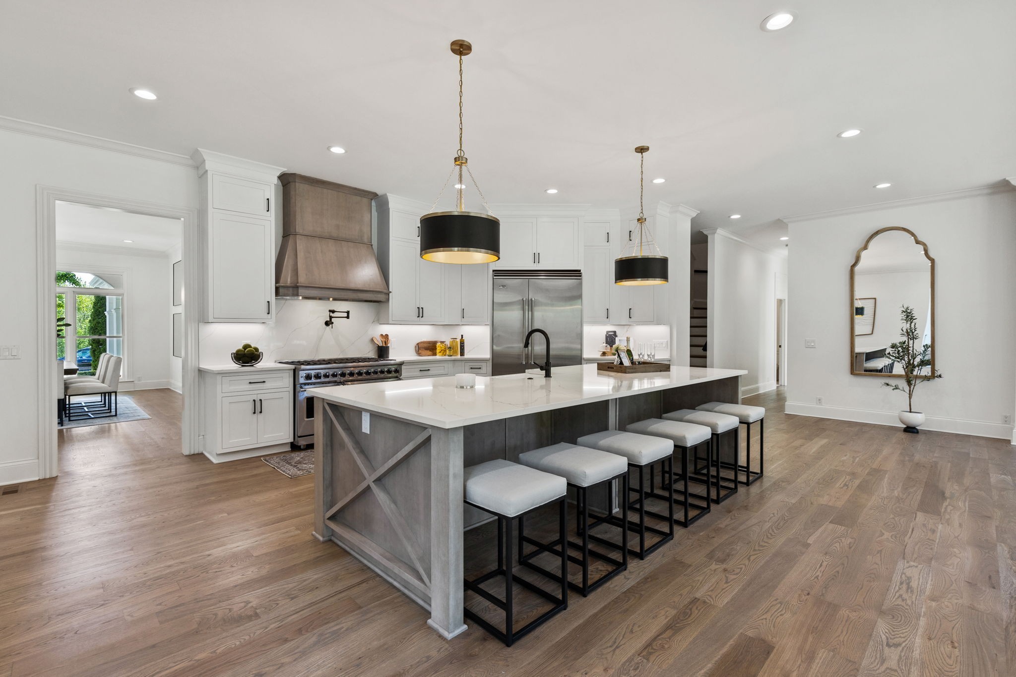 9050 Split Log Road Brentwood, TN 37027 - Photo 11 of 69 a large kitchen with kitchen island a sink table and chairs