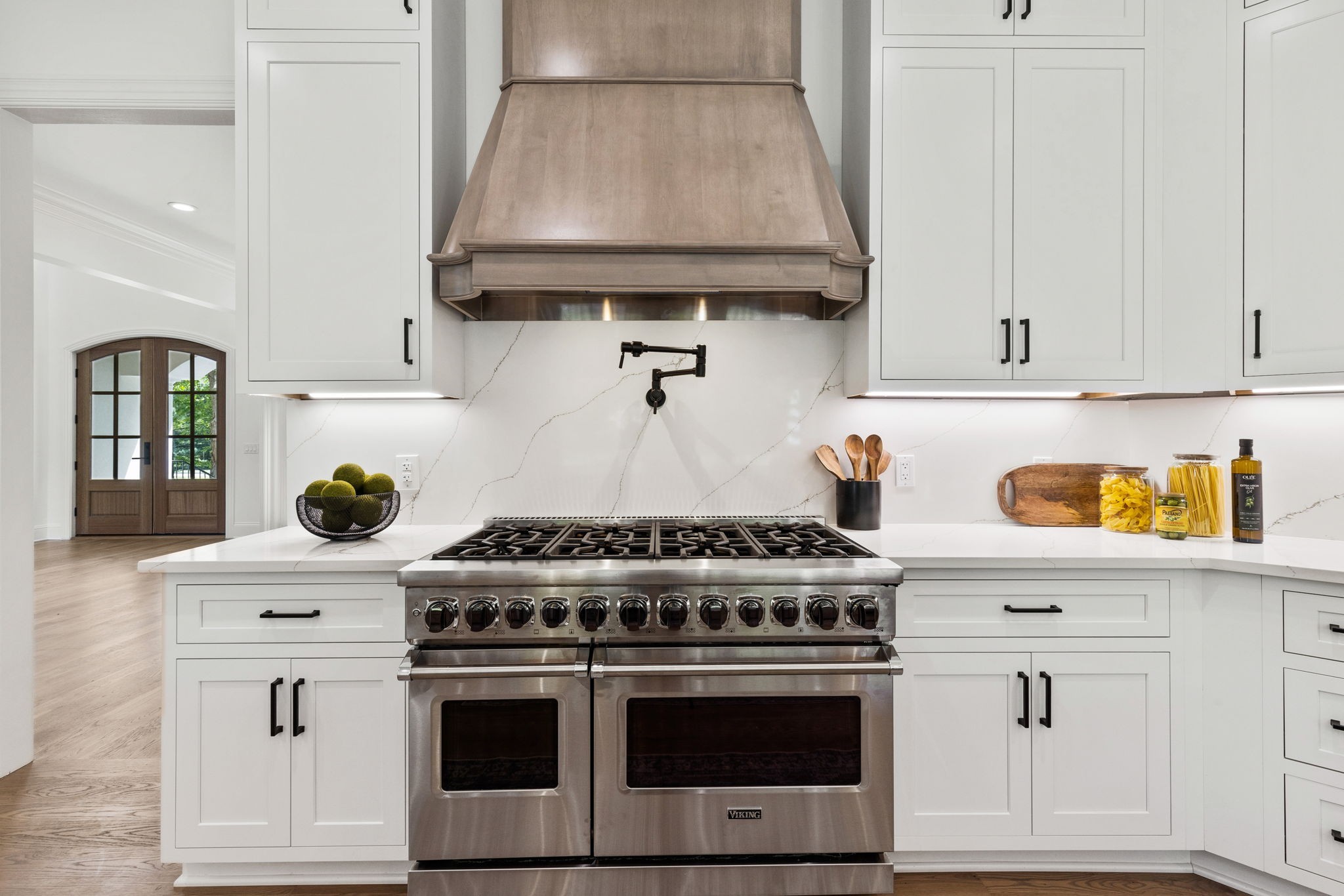 9050 Split Log Road Brentwood, TN 37027 - Photo 15 of 69 a white stove top oven sitting inside of a kitchen