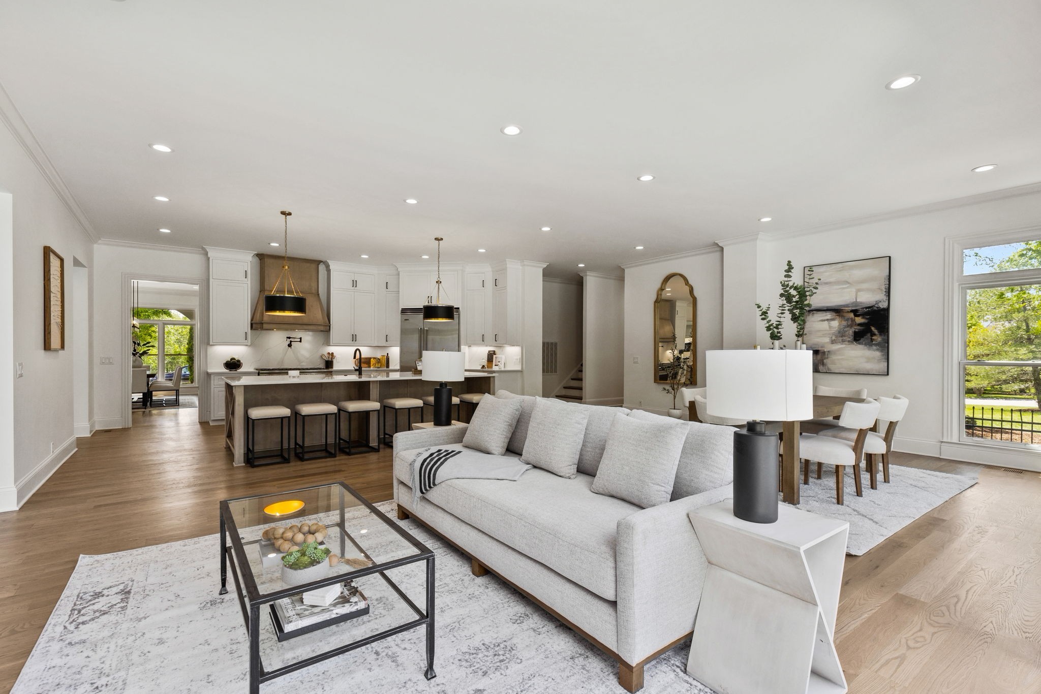 9050 Split Log Road Brentwood, TN 37027 - Photo 18 of 69 a living room with furniture kitchen view and a wooden floor