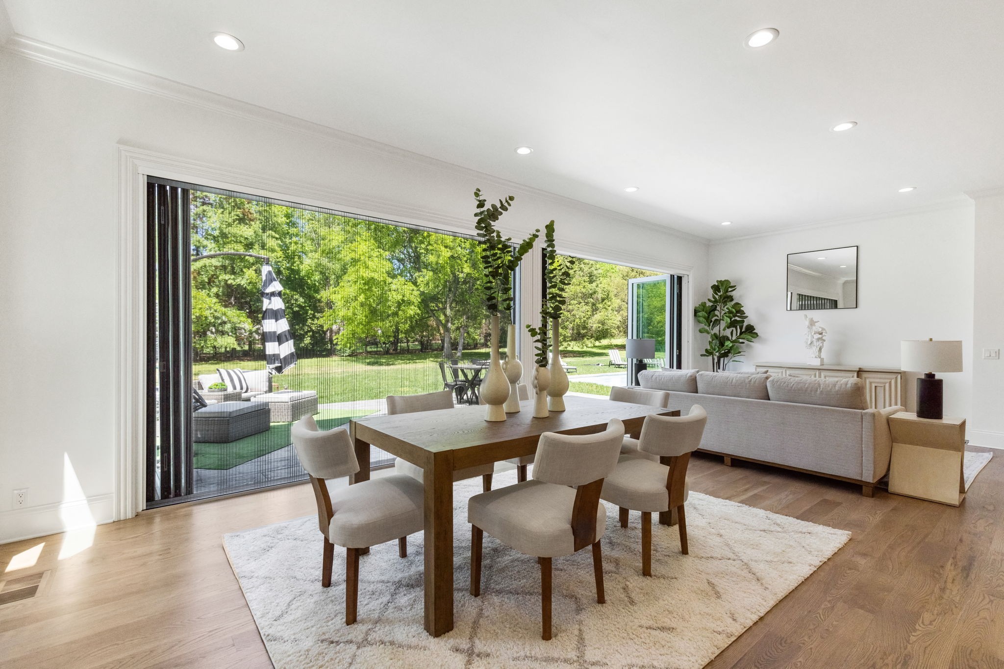 9050 Split Log Road Brentwood, TN 37027 - Photo 20 of 69 a dining room with furniture window and wooden floor