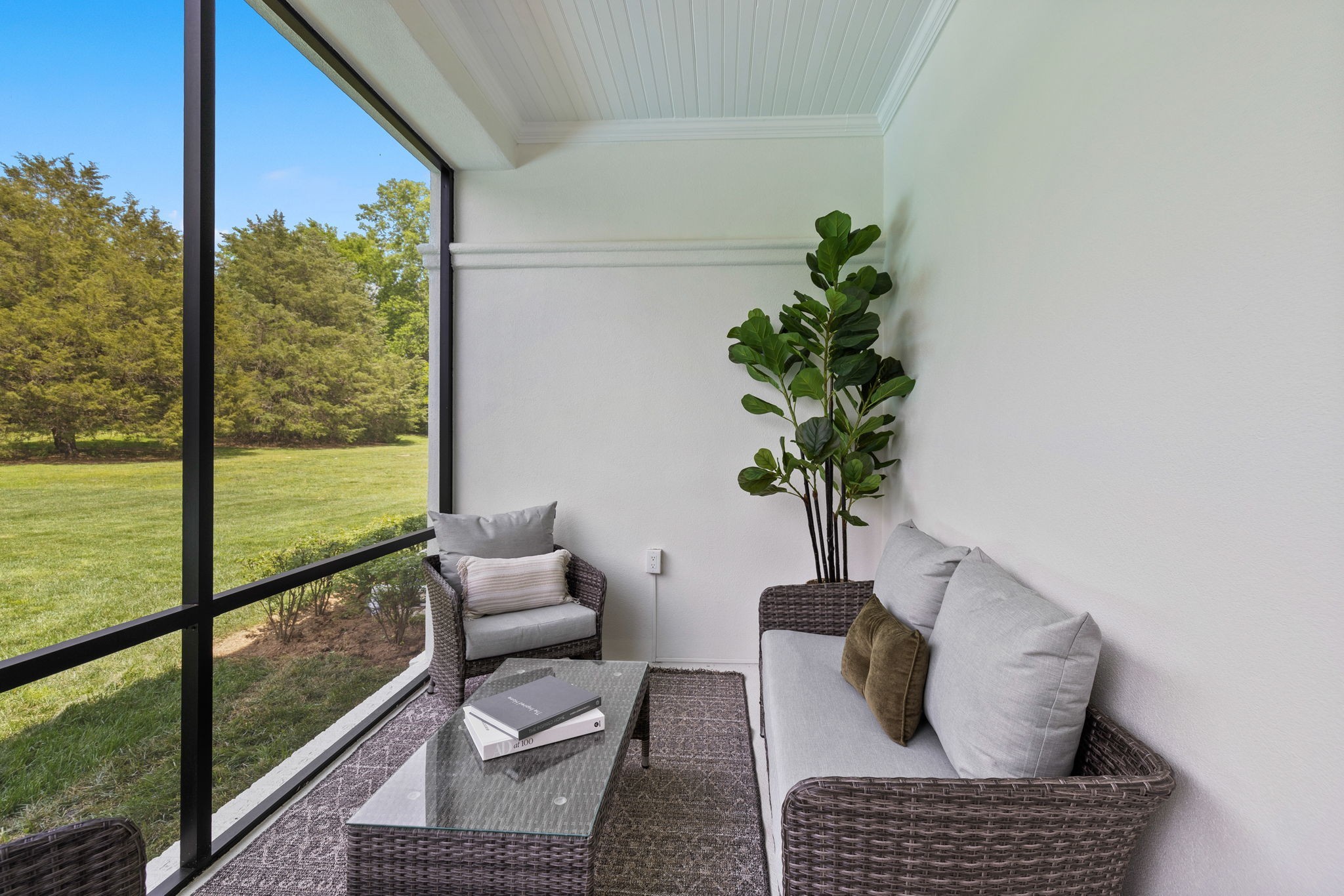 9050 Split Log Road Brentwood, TN 37027 - Photo 28 of 69 a view of porch with furniture and a potted plant