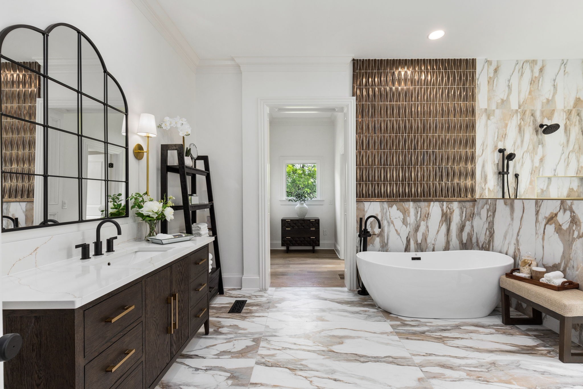 9050 Split Log Road Brentwood, TN 37027 - Photo 29 of 69 a bathroom with a bathtub sink and mirror
