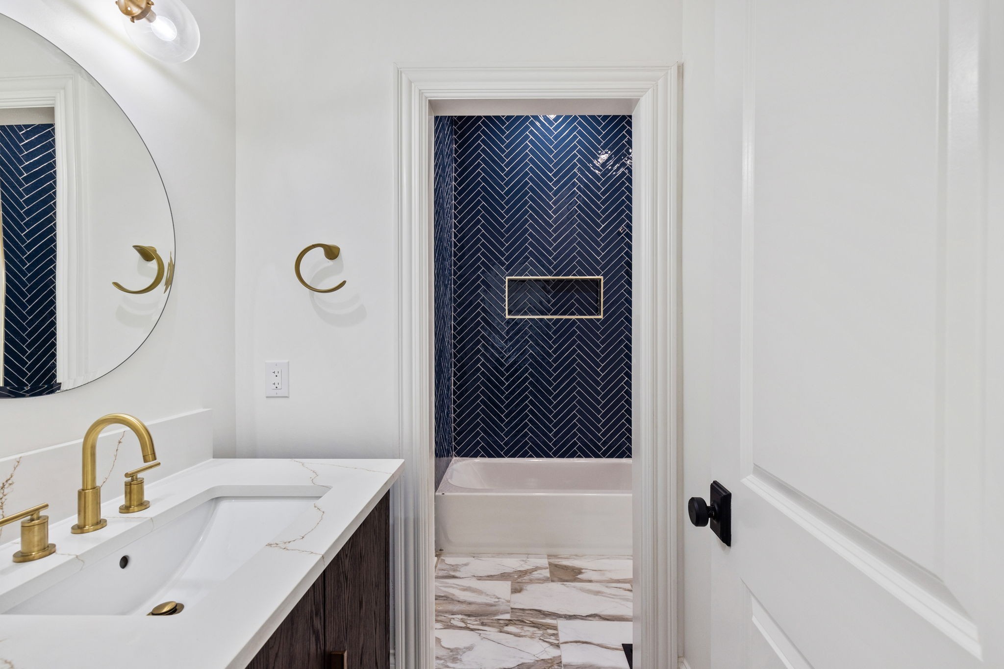 9050 Split Log Road Brentwood, TN 37027 - Photo 37 of 69 a bathroom with a sink and a mirror