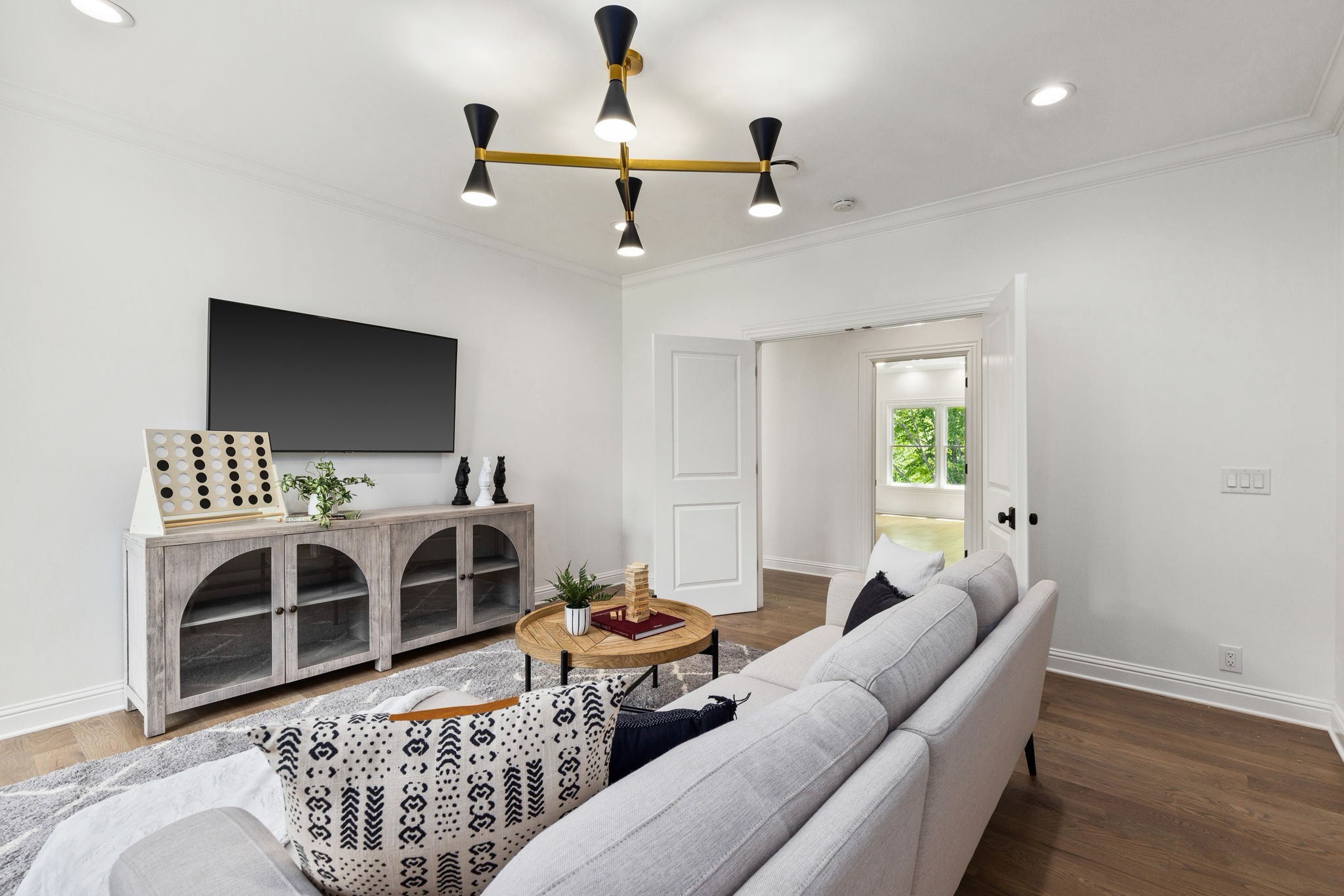 9050 Split Log Road Brentwood, TN 37027 - Photo 45 of 69 a living room with furniture and a flat screen tv