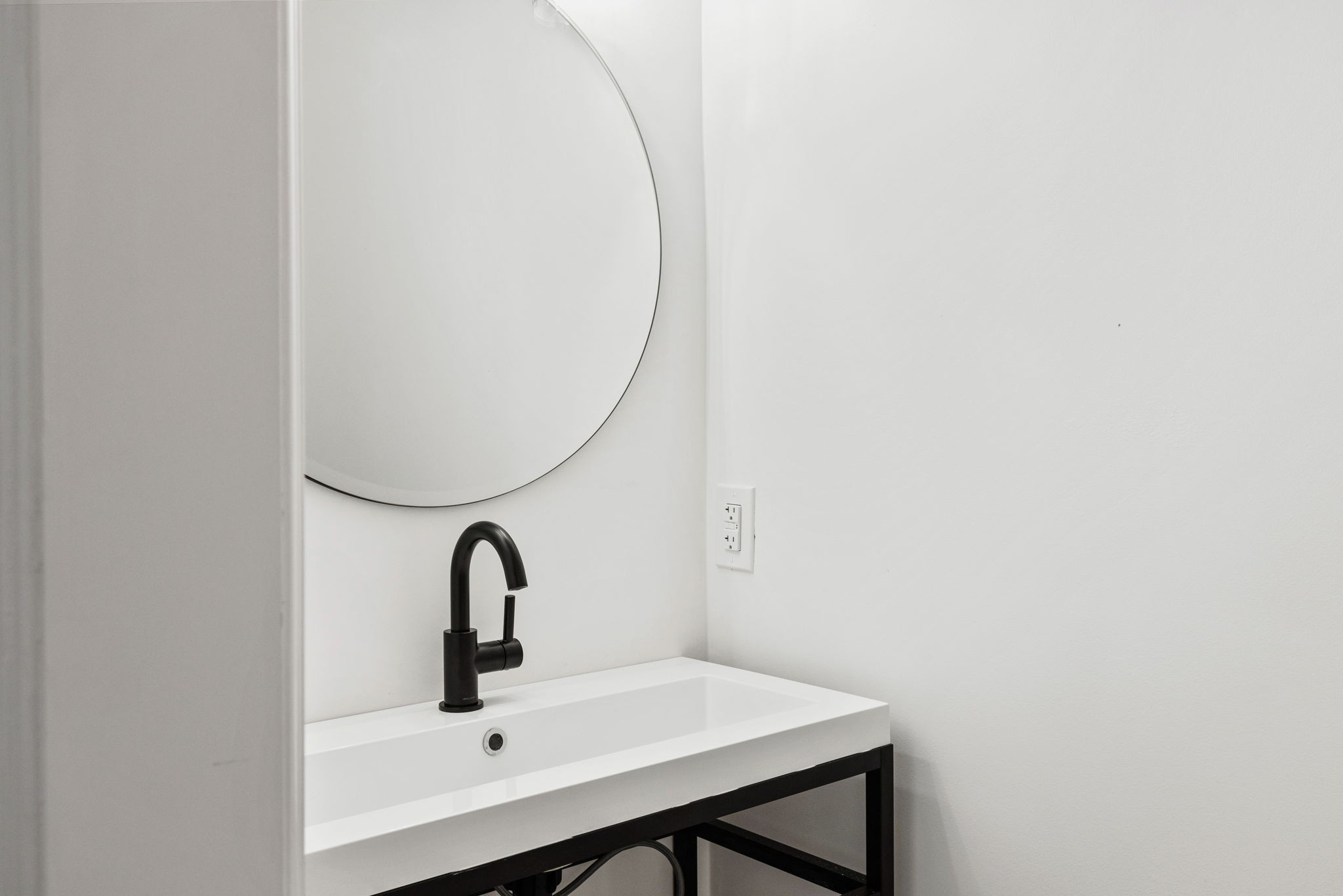 9050 Split Log Road Brentwood, TN 37027 - Photo 46 of 69 a room with a sink and a mirror