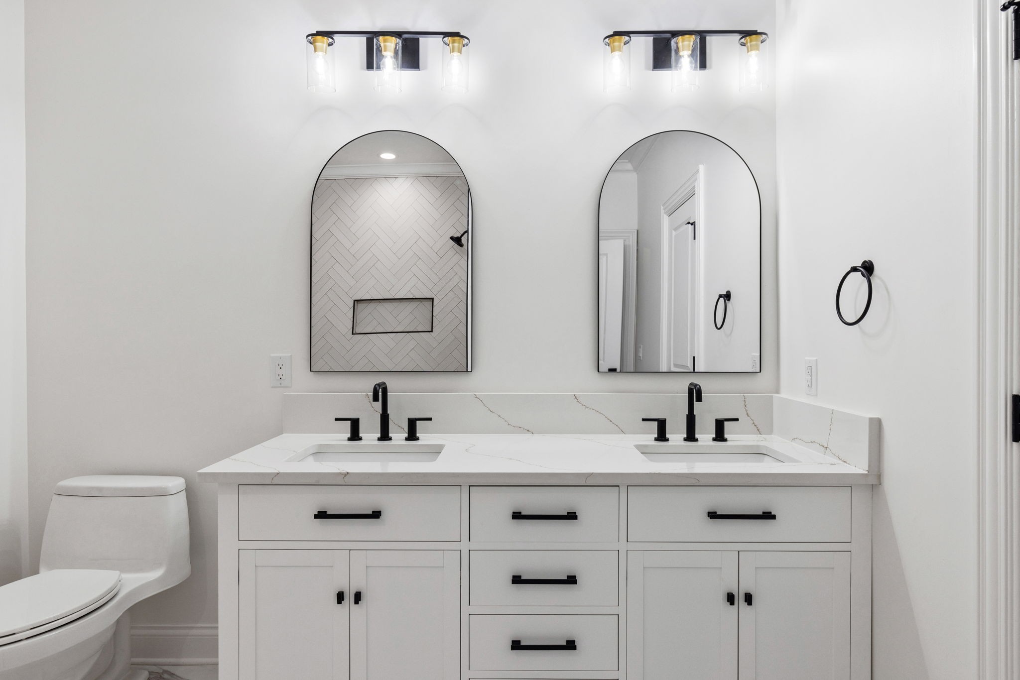 9050 Split Log Road Brentwood, TN 37027 - Photo 59 of 69 a bathroom with 2 sink and a mirror