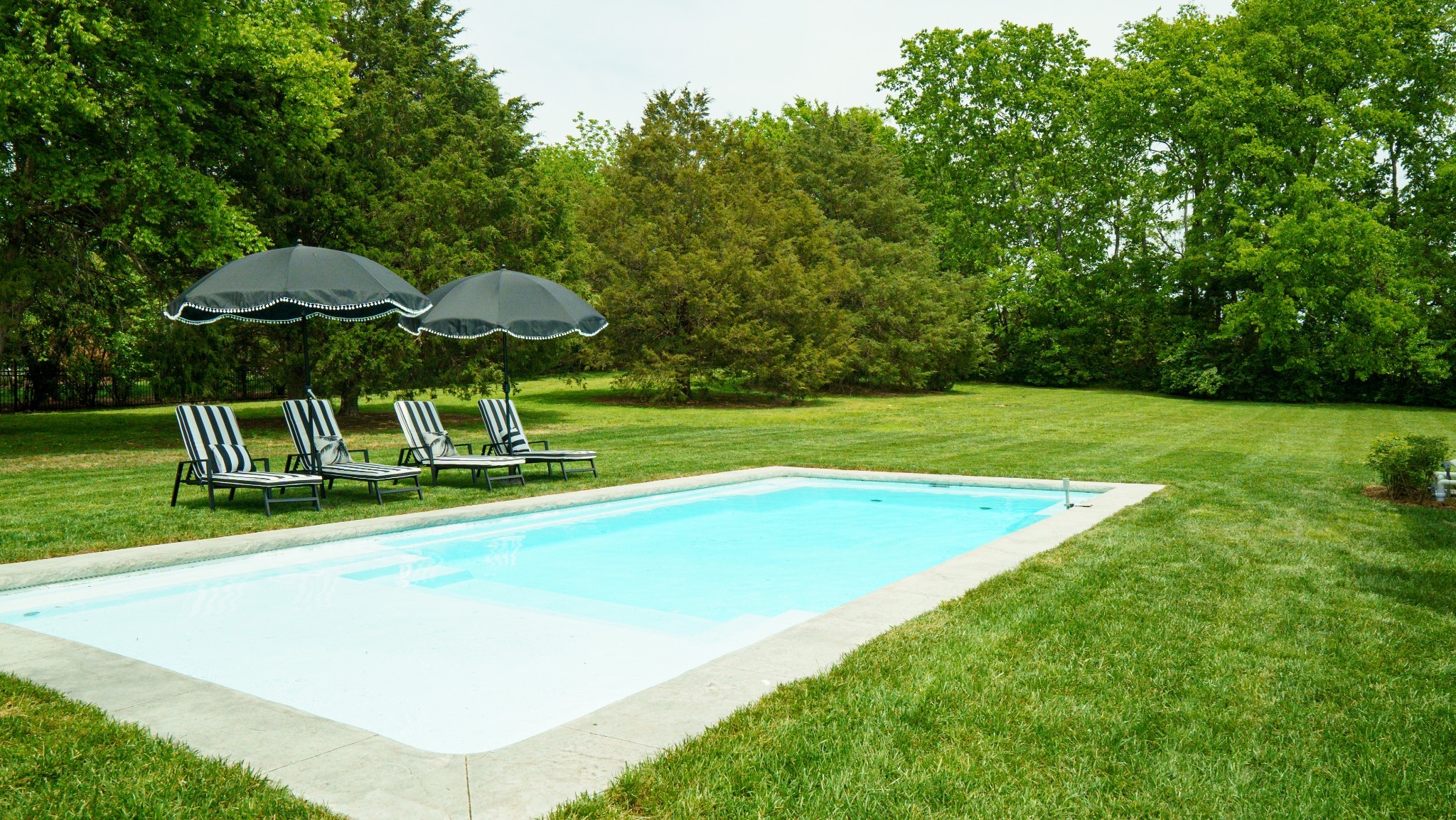 9050 Split Log Road Brentwood, TN 37027 - Photo 63 of 69 a view of a big yard with swimming pool