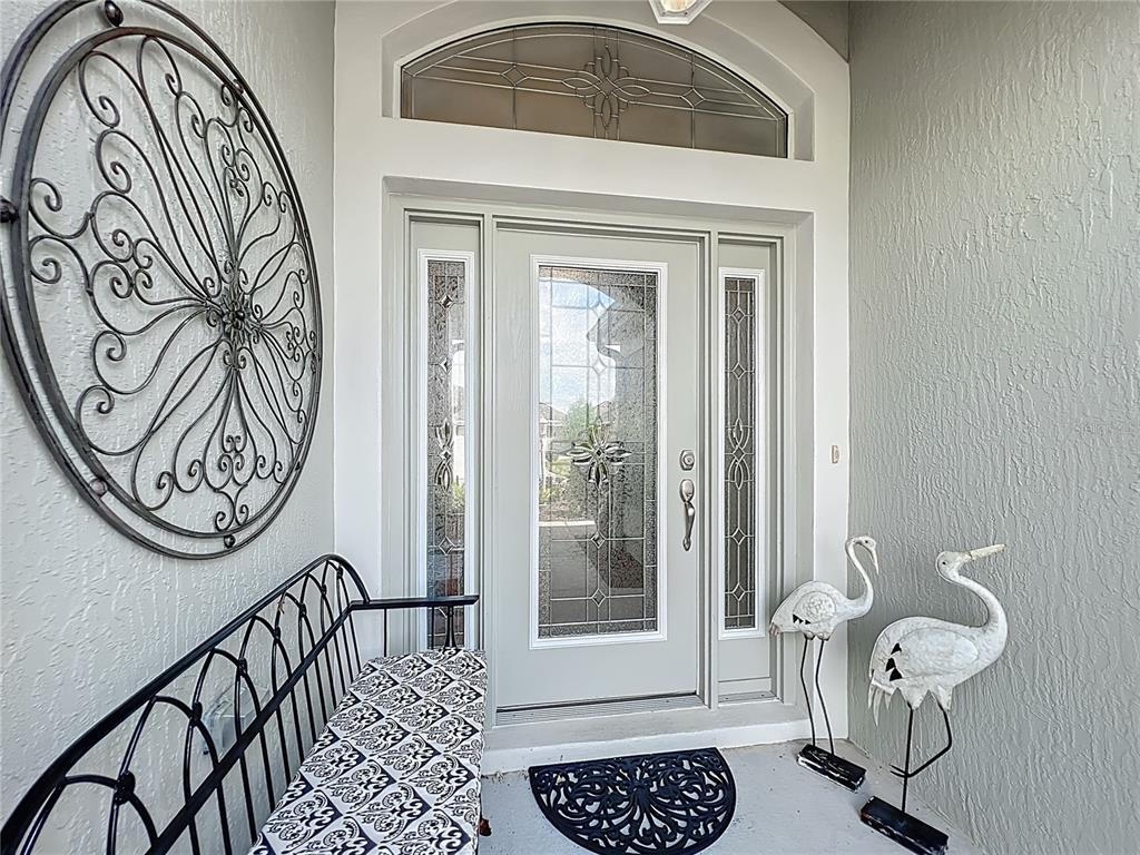 2875 Rain Lily Loop The Villages, FL 32163 - Photo 2 of 36 a view of a hallway with entryway