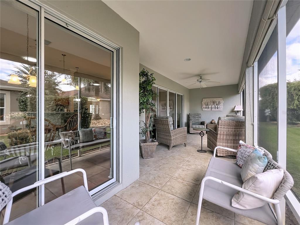 2875 Rain Lily Loop The Villages, FL 32163 - Photo 34 of 36 a living room filled with furniture