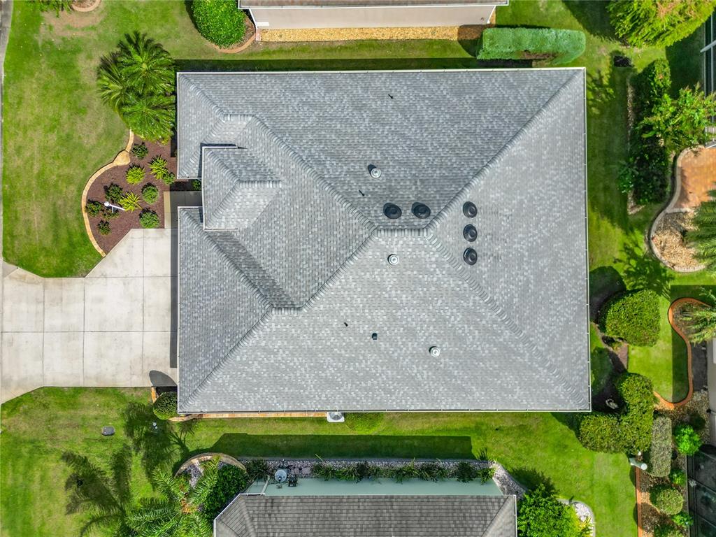 2875 Rain Lily Loop The Villages, FL 32163 - Photo 36 of 36 an aerial view of a house with a yard