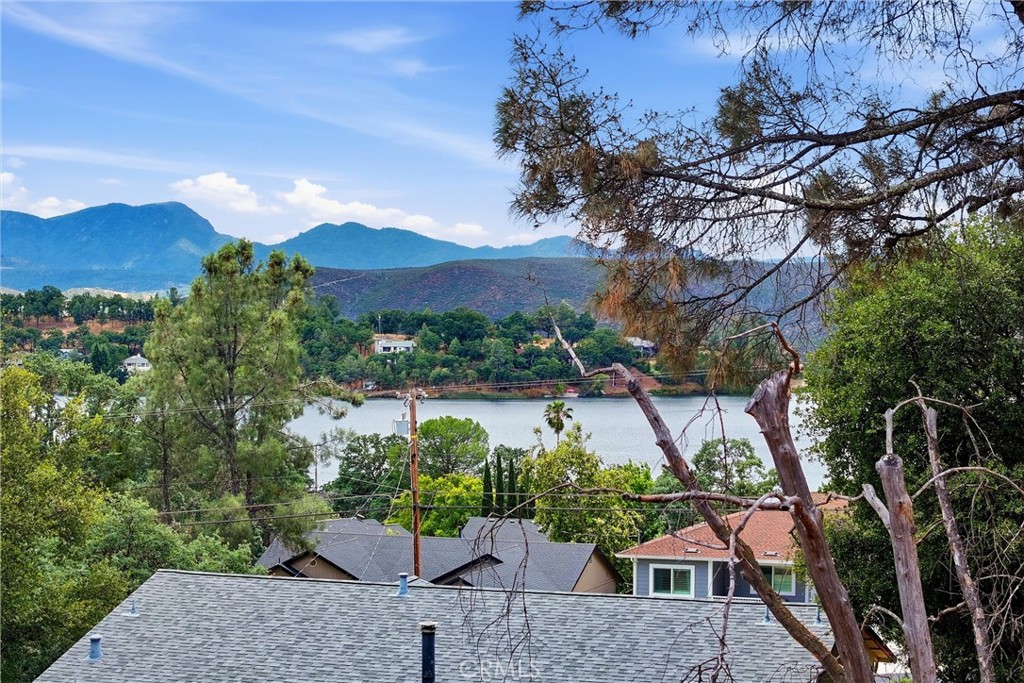 18685 Oak Grove Road Hidden Valley Lake, CA 95467 - Photo 49 of 52 a view of a house with a yard and garden